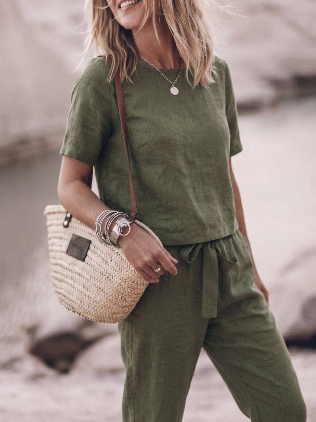 Three-piece cotton-linen set in monochrome with relaxed top and straight-leg pants on model