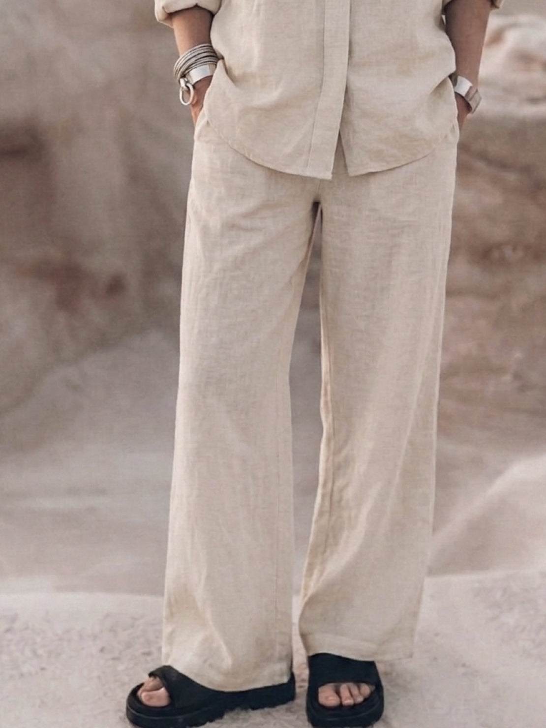 Woman wearing an oversized 100% cotton shirt and wide-leg pants co-ord set in a relaxed style