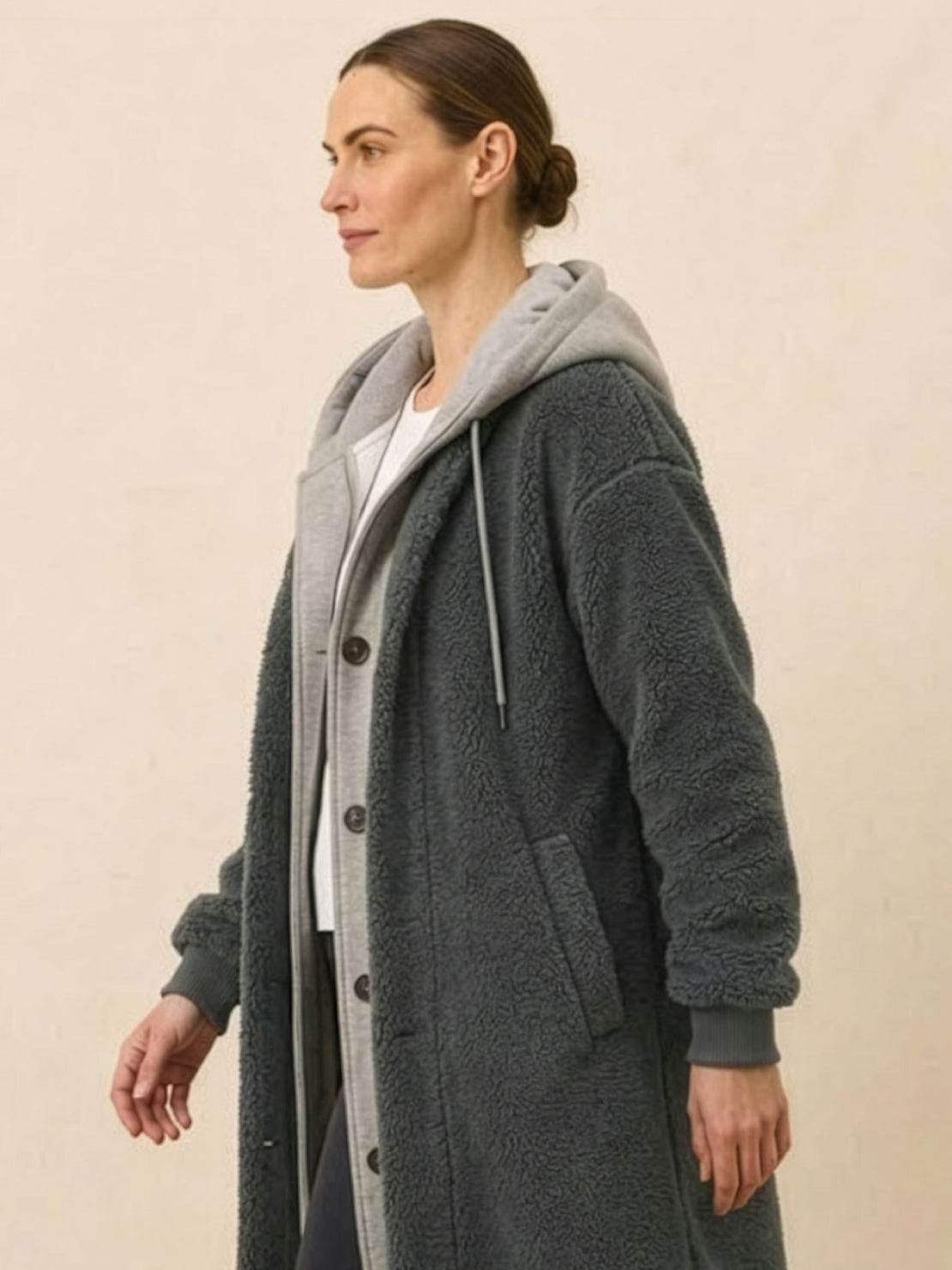 Woman wearing gray everyday wear oversized sherpa long coat with cozy sherpa lining and relaxed stylish silhouette