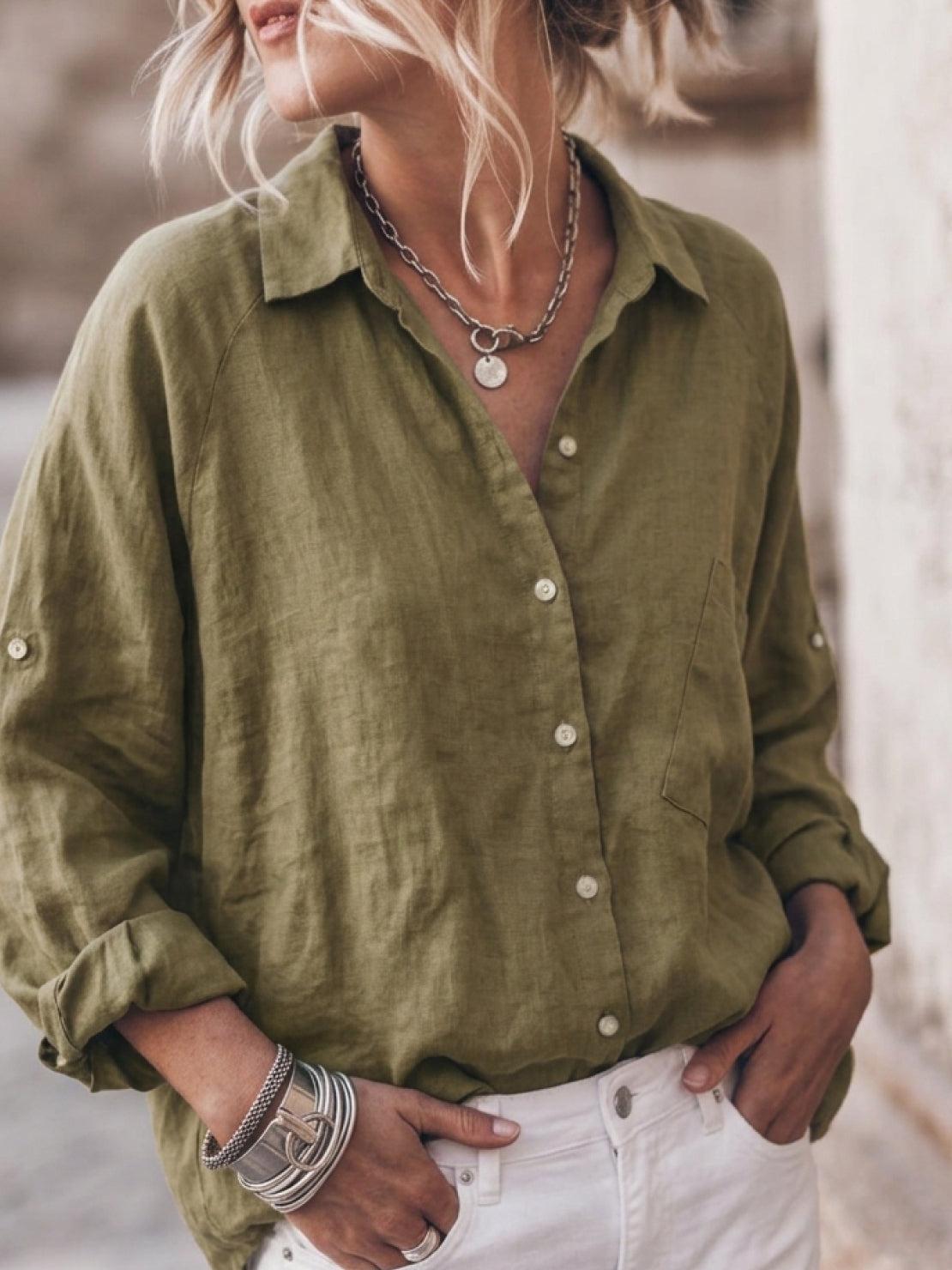 oversized relaxed cotton linen shirt with dropped shoulders and back pleat detail on white background