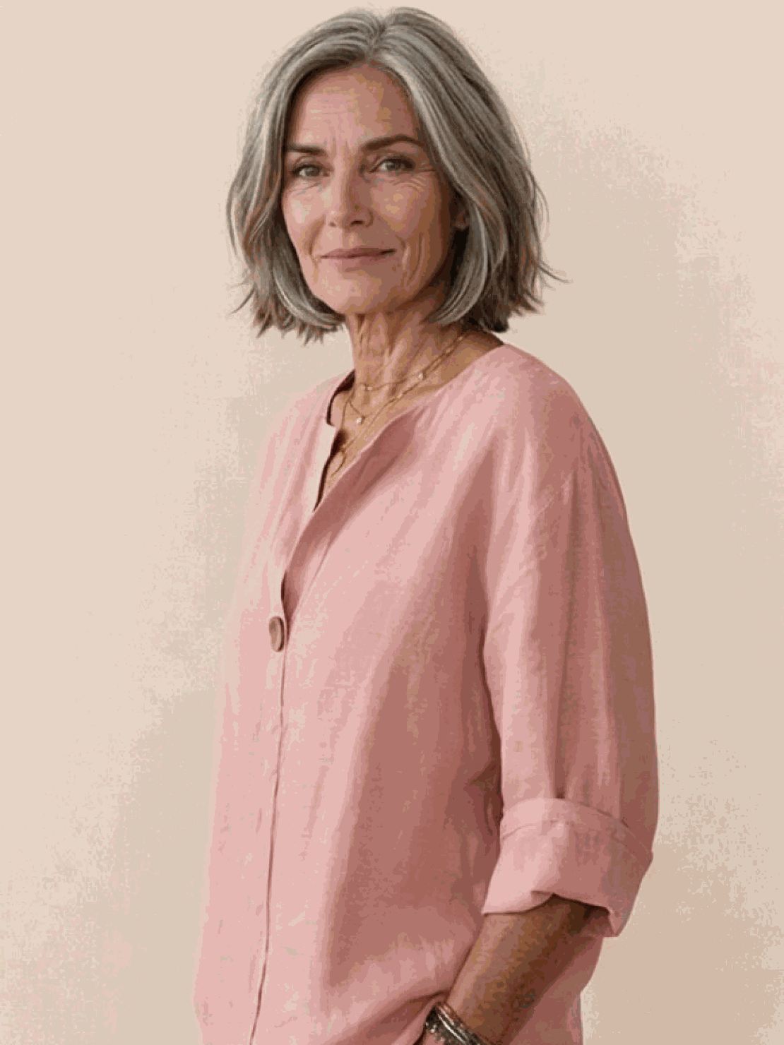 White pure linen age-defying shirt with button detail on a hanger