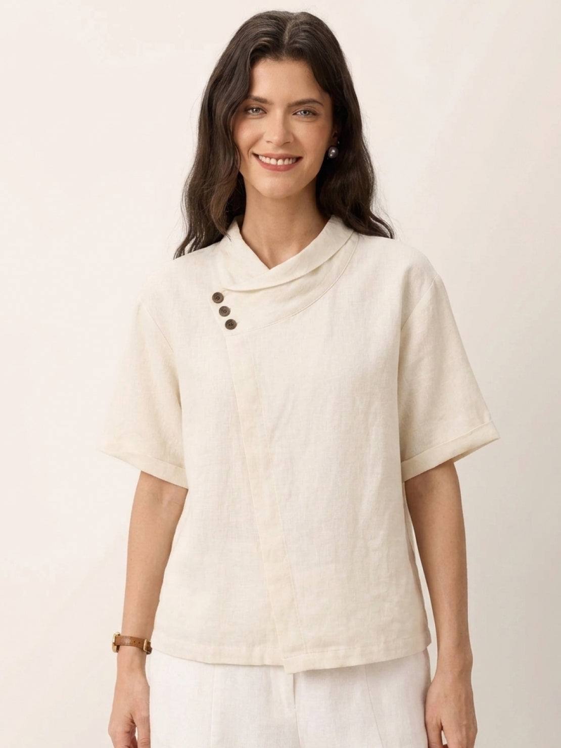 women wearing 100% linen relaxed V-neck top with asymmetrical button detail