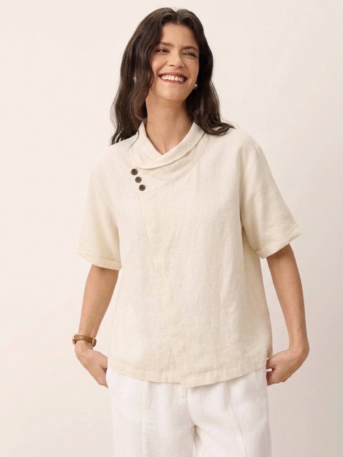 100% linen relaxed V-neck top with asymmetric buttons and short sleeves in breathable fabric