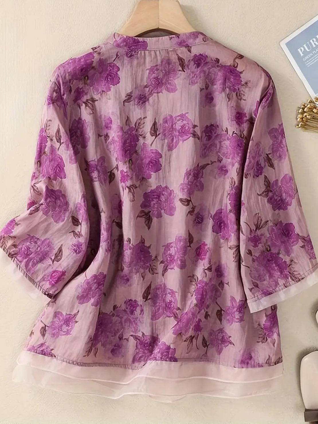 French boutique style organza floral print blouse with elegant lightweight fabric and sophisticated design