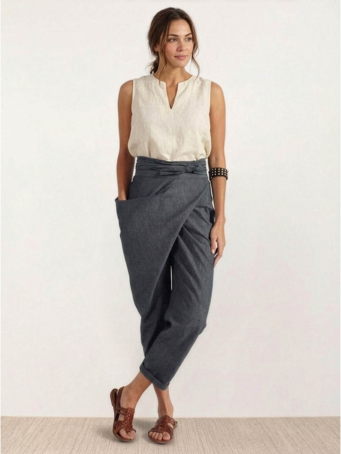Woman wearing high-waist wrapped comfy pants with breathable stretch fabric and unique wrap design