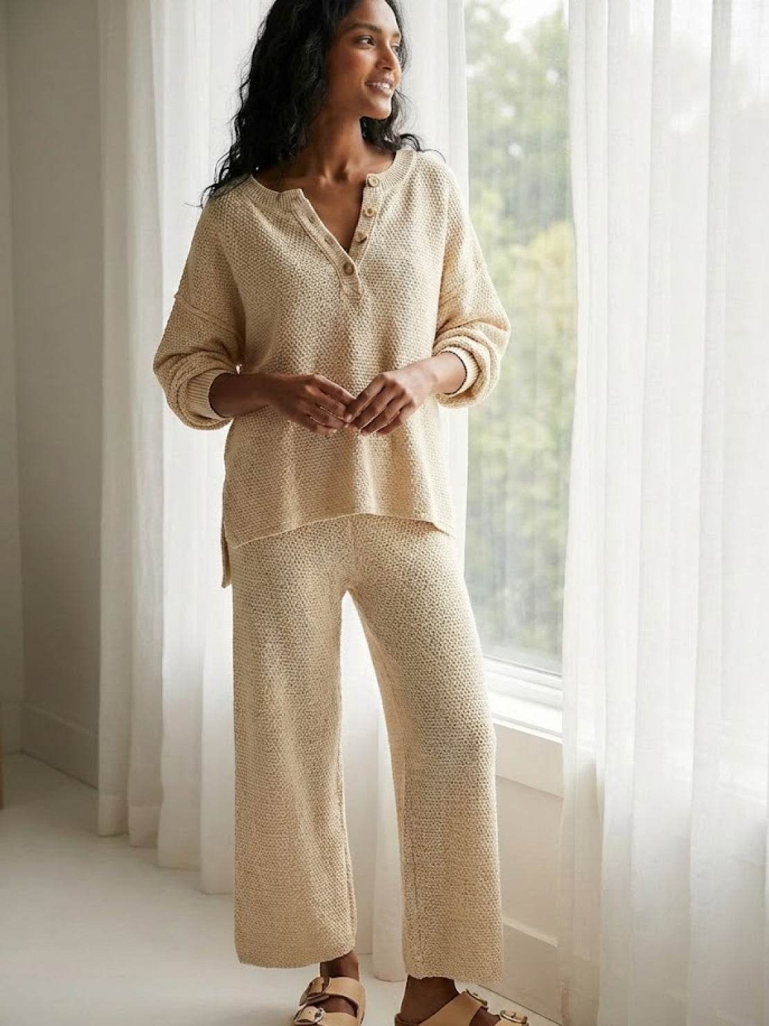 Woman wearing a multi-weather comfort oversized two-piece set with cropped wide pants and long sleeves in a casual relaxed fit