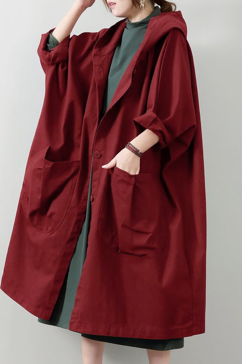 Oversized water resistant windbreaker jacket in maroon with hood and large pockets, one size fits all, lightweight and longline design
