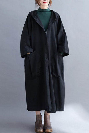 One size fits all oversized black waterproof windbreaker jacket with hood and large pockets.