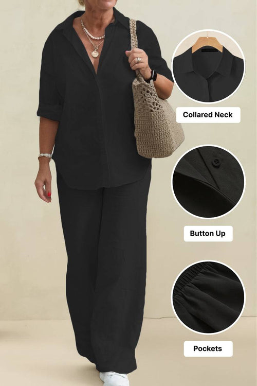 Black oversized 100% cotton shirt and wide-leg pants co-ord set with collared neck, button up front, and pockets.