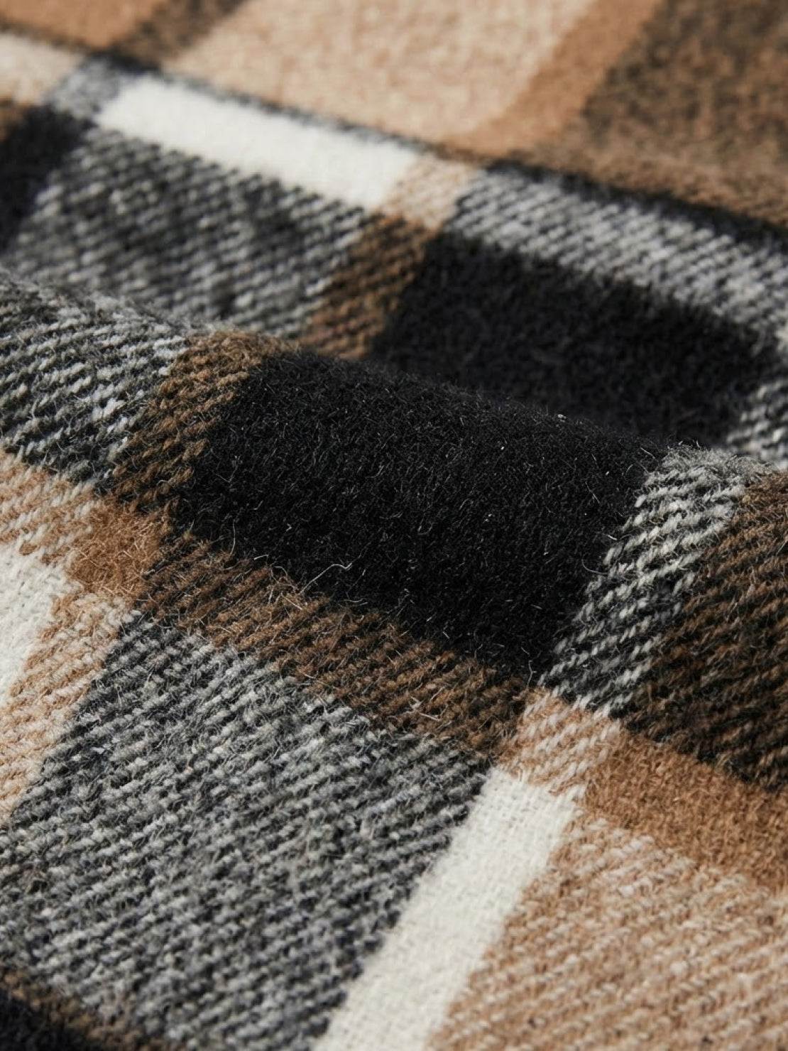 Oversized medium-length blue plaid overshirt jacket with wool-blend fabric and functional pockets