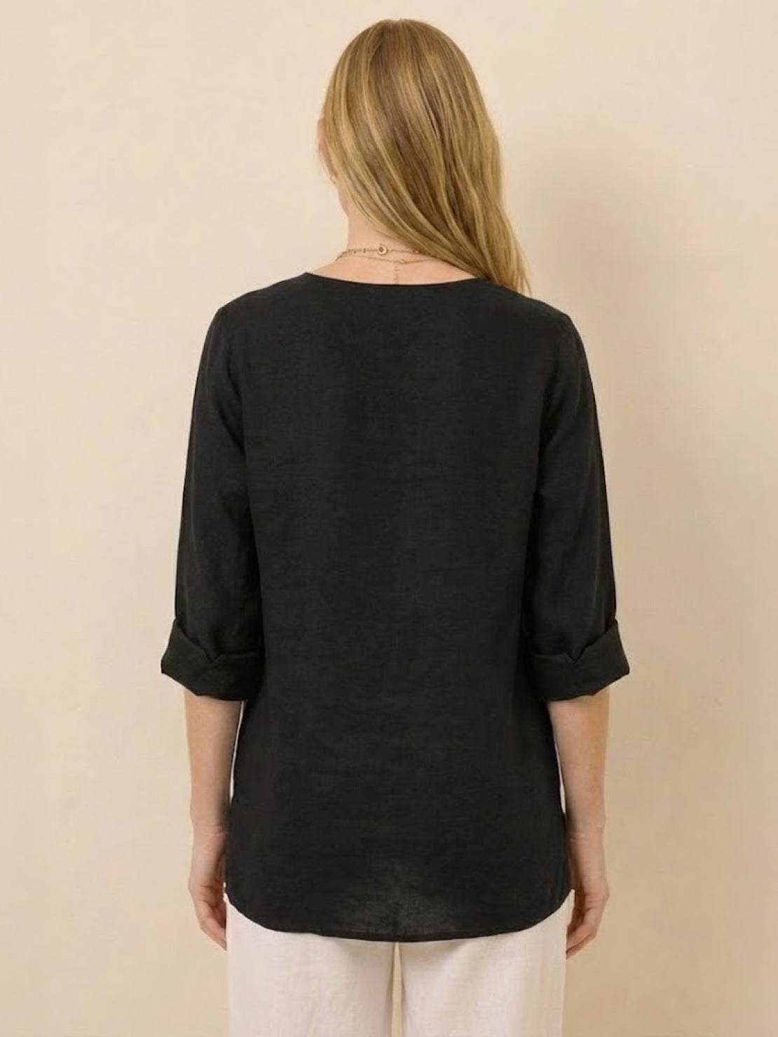 white pure linen age-defying shirt with button detail on hanger