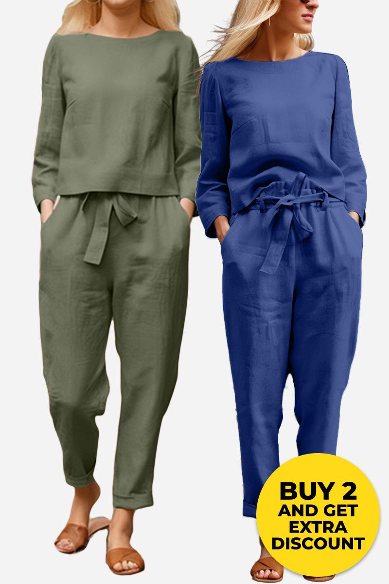 Two women wearing retro monochrome linen two-piece sets in olive green and blue with a relaxed fit and tie waist pants.