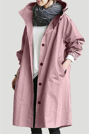 Trendy oversized pink Rain Couture Windbreaker for women, lightweight and water-resistant with hood and pockets.