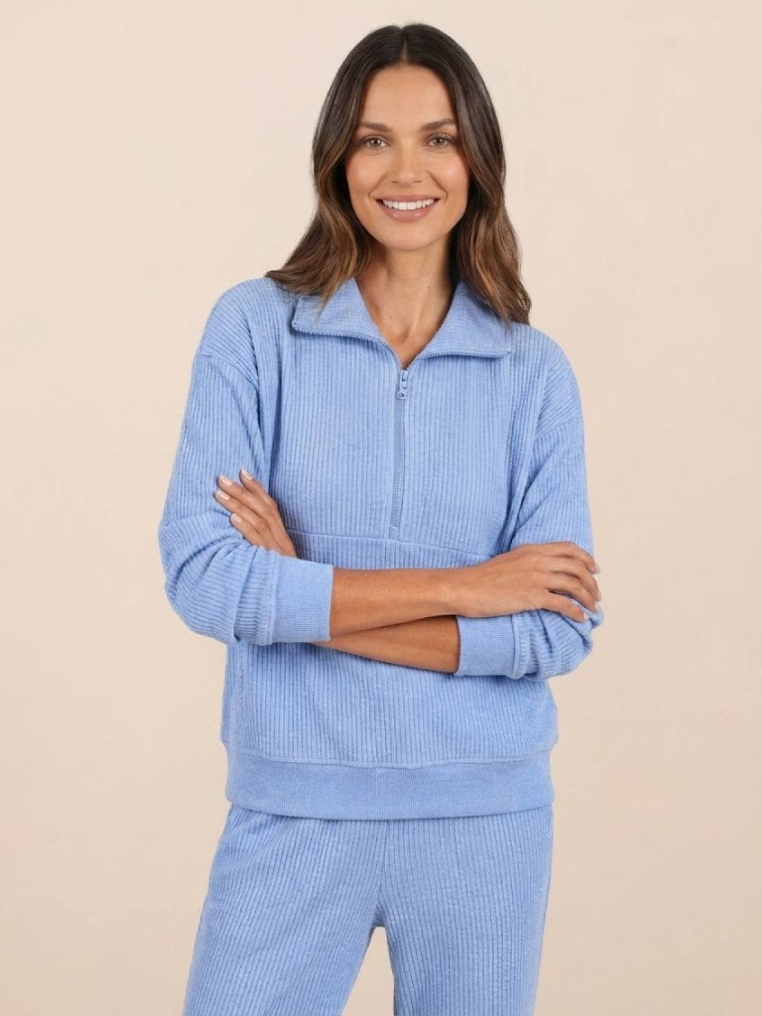 Unisex half-zip pullover and sweatpants set in relaxed fit with soft fabric for casual wear and travel