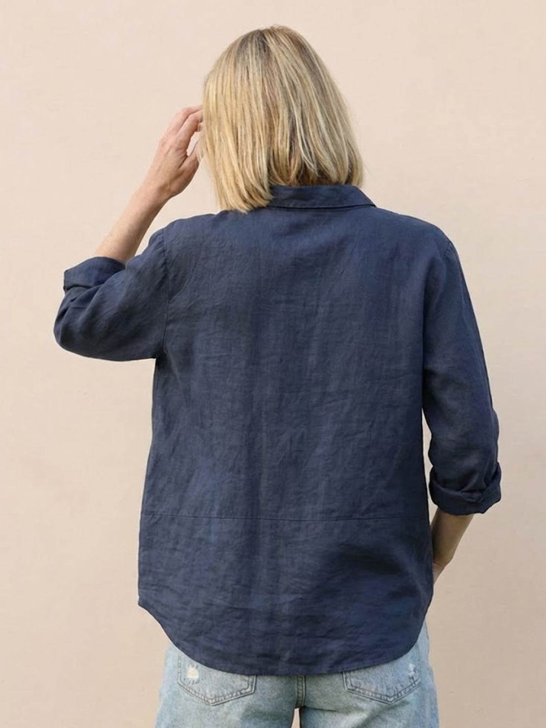 Vintage linen shirt made of breathable cotton-linen blend, perfect for casual chic and travel-friendly style.