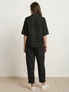100% cotton artisan two-piece set with oversized button-front shirt and wide-leg pants