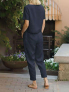 Cotton linen monochrome straight-leg pants with adjustable drawstring waist and breathable natural texture