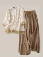 100% Cotton Linen Tuscany Rise two-piece set with sheer embroidered top and wide-leg linen trousers in natural color