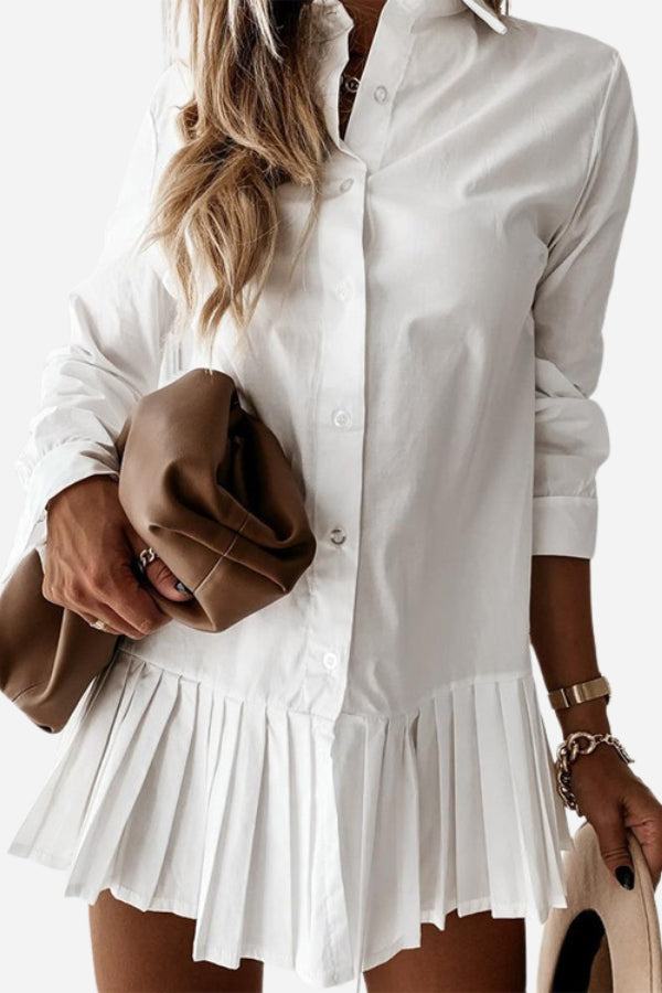 White pleated fashion plain shirt dress with long sleeves and button-down front, styled with casual accessories