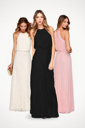 Three women wearing sleeveless belted maxi pleated dresses in white, black, and pink colors.