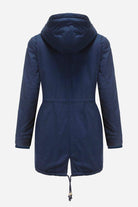Rear view of extra comfortable cotton parka coat in navy blue with hood and adjustable back hem