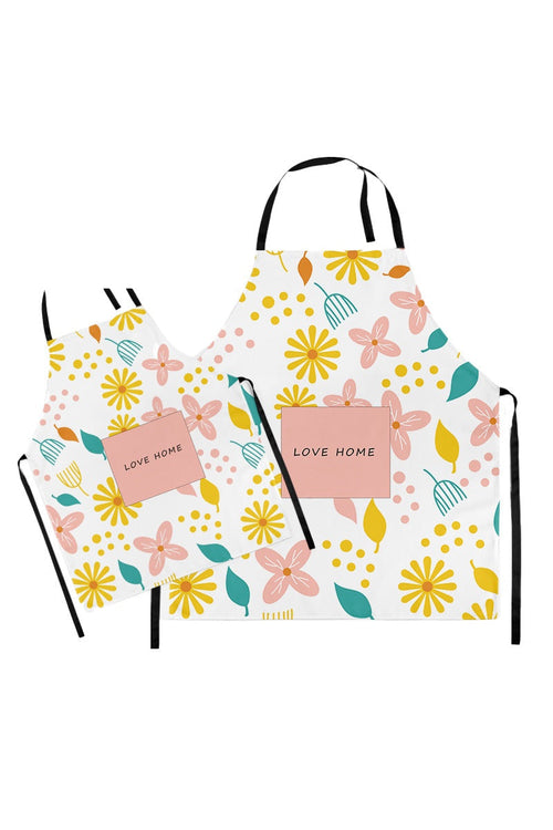 Mommy & Me Apron Set with colorful floral pattern and "Love Home" text, matching parent-child kitchen aprons.
