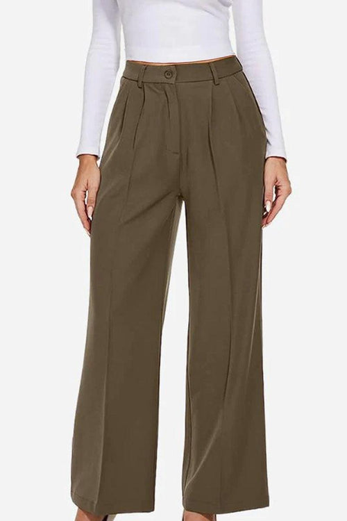 Woman wearing Classically Vogue Business Trousers in olive green with high-waist and tailored slim fit design.