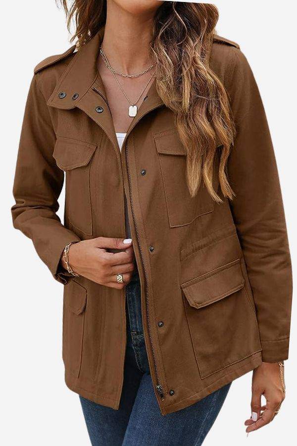Woman wearing brown fashion cargo utility jacket with multiple pockets and zipper front closure