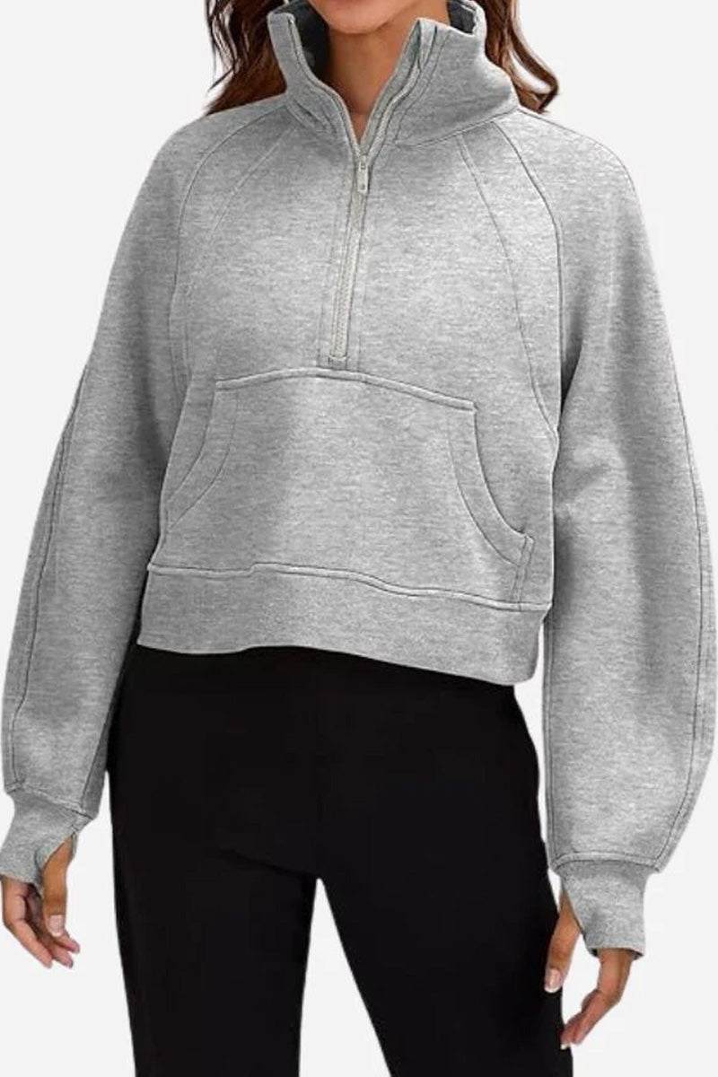 Cozy oversized half-zip grey fleece pullover sweatshirt with kangaroo pocket and relaxed fit