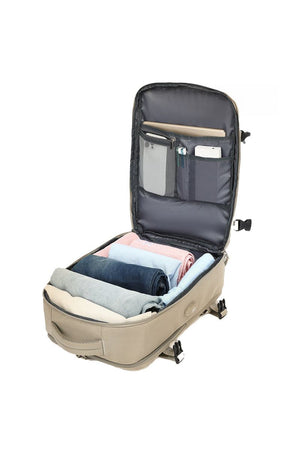 Open Chic Wanderlust Waterproof Backpack showing organized spacious compartments and packed clothes