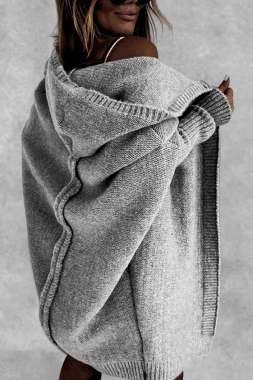 Gray warm oversized hooded cardigan with relaxed fit and cozy knit fabric worn off-shoulder