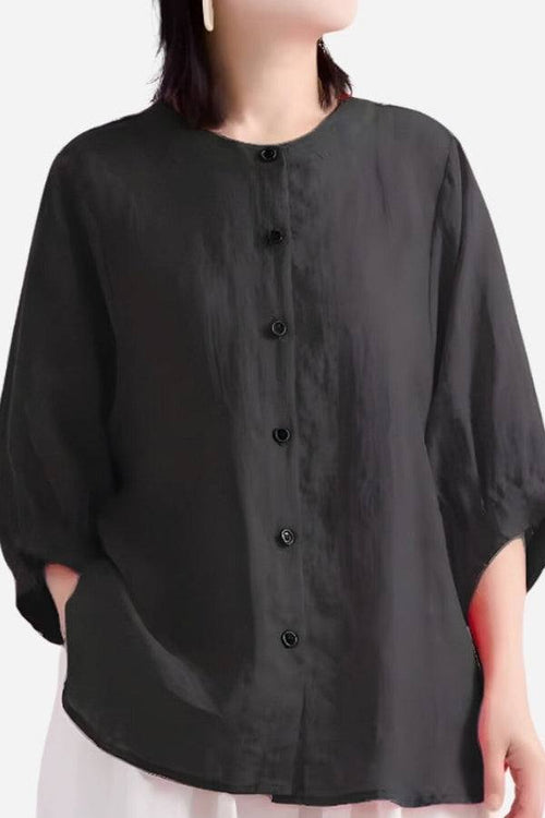 Relaxed loose breathable linen black blouse with button-down front and relaxed fit for summer wear