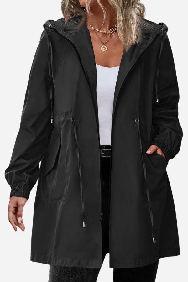 Black packable water-resistant windbreaker jacket with hood and adjustable waist for women