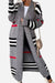 Cozy striped long knitted cardigan with oversized fit and red, black, white stripes on grey fabric