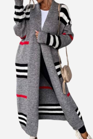 Cozy striped long knitted cardigan with oversized fit and soft fabric for warmth and style