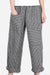 High waist striped comfort pants with large patch pockets and rolled cuffs on model
