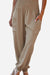 Boho Dreamer high-waist elastic pants in beige with side pockets and cuffed ankles