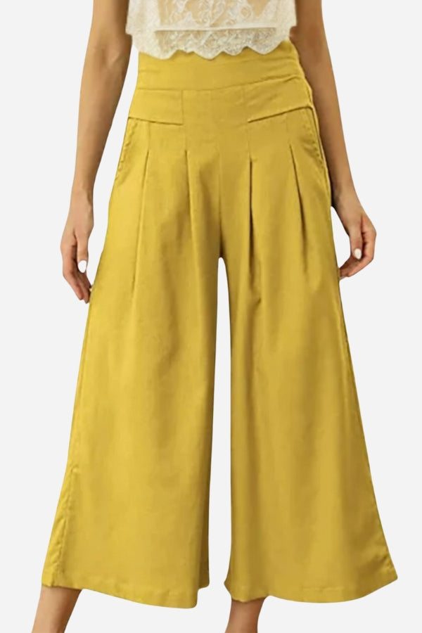 Yellow high-waisted lightweight palazzo pants for women with pleats and a wide-leg fit, perfect for summer elegance.