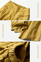 Sun-Kissed Elegance lightweight palazzo pants in mustard yellow with wide legs, adjustable waist, and feminine silhouette.