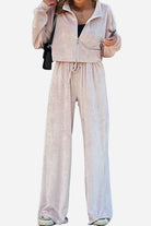Women's zip up cropped velour jacket and wide leg pants two-piece leisure co-ord set in light beige