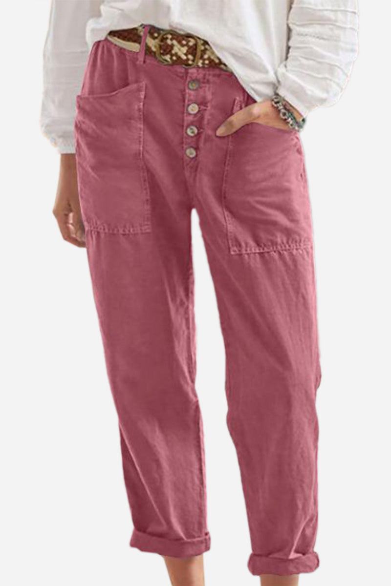 Women's casual button-down utility-chic trousers in pink with deep pockets and rolled cuffs.