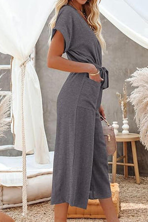 Gray V-neck lace-up wide-leg jumpsuit with tie waist and pockets for women