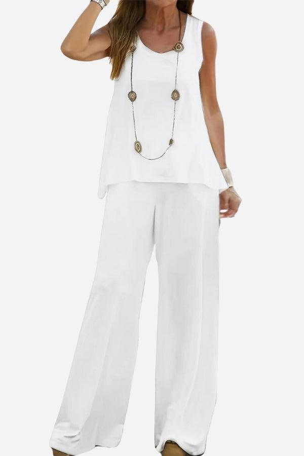 White two-piece co-ord outfit designed to balance apple-shaped body with sleeveless top and wide-leg pants.
