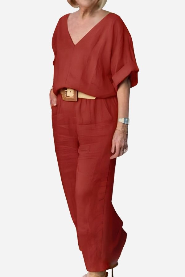 Red V-neck cotton two-piece trouser set with relaxed top and straight-leg pants