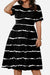 Black short-sleeved pleated dress with white horizontal stripes and a cinched high waist, featuring a modest knee-length cut and pockets.