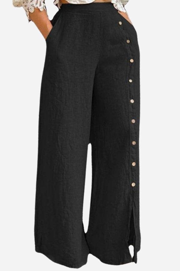 Black wide leg pants with side buttons and split seam detail, high-waisted breathable cotton blend trousers for a sophisticated maritime chic look.