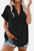 Black V-neck collared button blouse with rolled short sleeves and front pocket, styled with denim shorts.