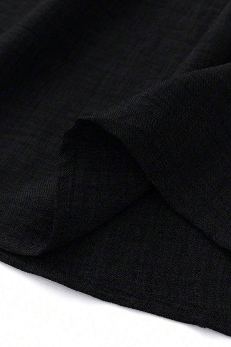 Close-up of lightweight black fabric used for high waist wide leg pants