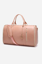 Pink no-wrinkle foldable travel bag with handles and shoulder strap in waterproof PU leather