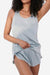 Woman wearing light blue Mulberry Silk Tank & Shorts Set lounge sleepwear